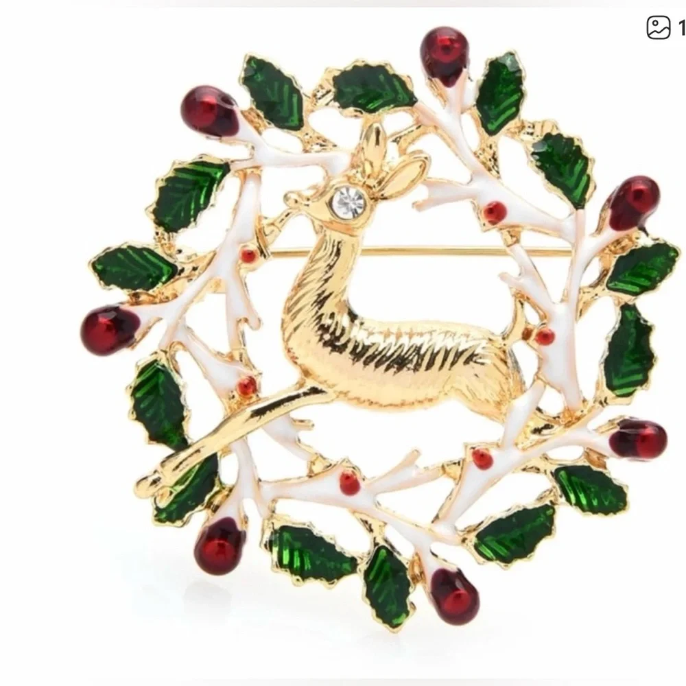 Elegant Gold Reindeer Brooch with Green and Red Accents